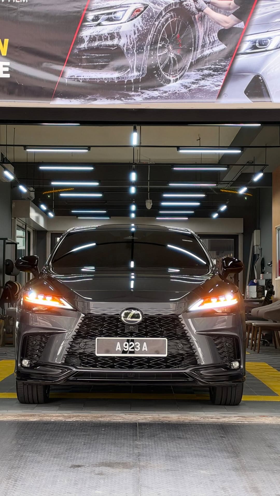 A Lexus RX after a 9H coating, under the lights in the ICAR Ipoh bay